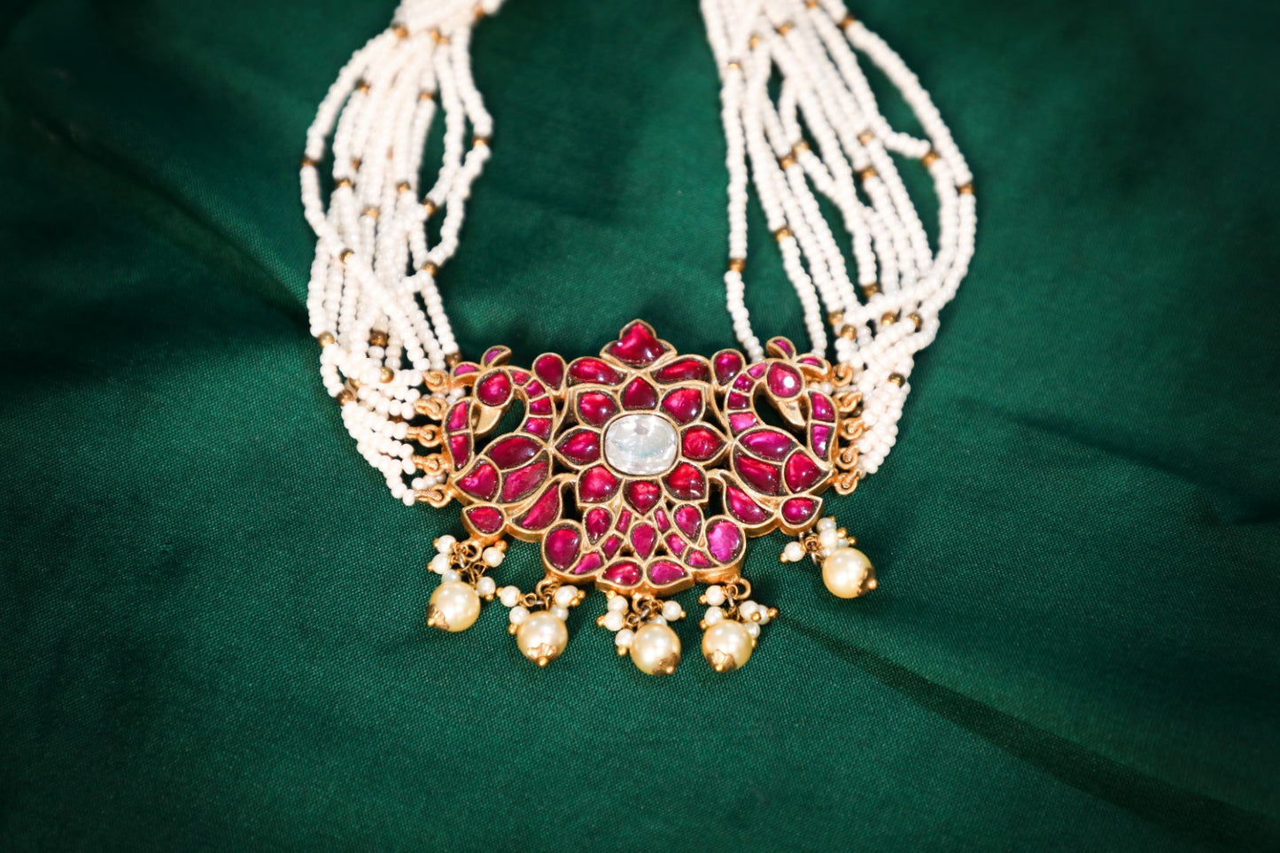 925 Silver Temple choker necklace with intricate red meena work coated with 22kt gold plating ,finished with natural pearl strings