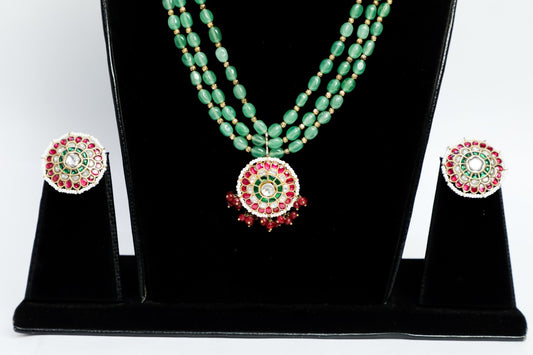 925 silver Meena necklace beautified with intricate enamel work, sewed with natural pearls and green jade ,finished with 22k pure gold plating .