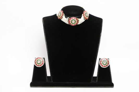 925 Silver Hand made Meena work neck choker weaved in natural cultured pearls studded with Kundan and finished with pure 22karat yellow gold