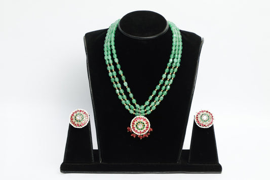 925 silver Meena necklace beautified with intricate enamel work, sewed with natural pearls and green jade ,finished with 22k pure gold plating .